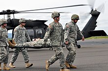 Oregon National Guardsmen simulating the evacuation of a casualty during a training exercise U.S. soldiers with the Oregon National Guard simulate the evacuation of a casualty at the Eugene Airport in Oregon May 2, 2012, during Vigilant Guard-Oregon 120502-A-NY487-470.jpg