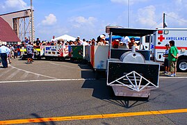 The bulk cart of the airbase is remodelled into the train and pick up a person in it.