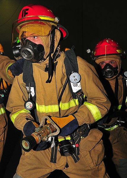 File:US Navy 090603-N-6233C-049 Aviation Electronics Technician Airman Travis Bones fights a simulated fire in the hangar bay of the aircraft carrier USS George Washington (CVN 73).jpg