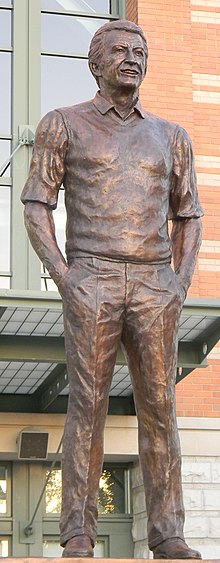 Bob Uecker Bobble head next to Bob's bench statue at Miller Park