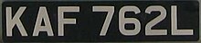 Early ANPR systems were unable to read white or silver lettering on black background, as permitted on UK vehicles built prior to 1973. United Kingdom license plate KAF 762L 1963.jpg