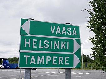 Road signs in Pirkkala, Finland guiding a motorist to the motorway leading to Vaasa, Helsinki and Tampere.