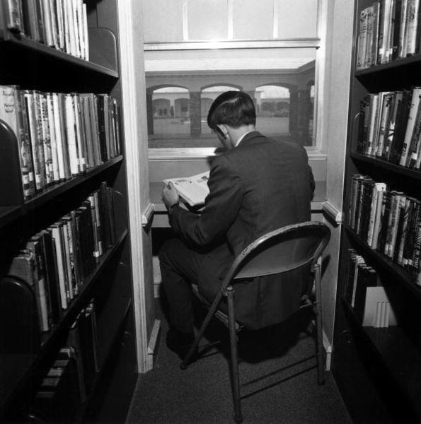 File:View of a Pine Crest School student reading in the library Fort Lauderdale, Florida (4545968233).jpg