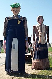 Two processional giants, an important element of Belgian and Northern French folklore, pictured in Brussels, Wisconsin. Walloon Giants Belgian Day Wisconsin.jpg