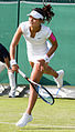 Wang Yafan competing in the first round of the 2015 Wimbledon Qualifying Tournament at the Bank of England Sports Grounds in Roehampton, England. The winners of three rounds of competition qualify for the main draw of Wimbledon the following week.