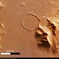 'Hourglass' shaped craters filled with traces of glacier ESA209972.jpg