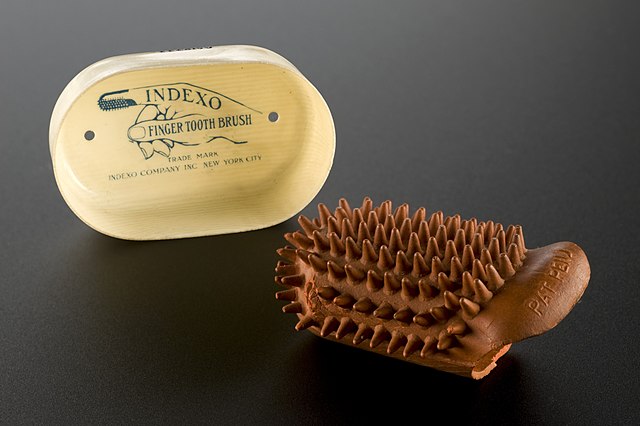 'Indexo' finger toothbrush, New York, United States, 1901–1919. It is made entirely of rubber, which has been shaped to fit over the index finger.
