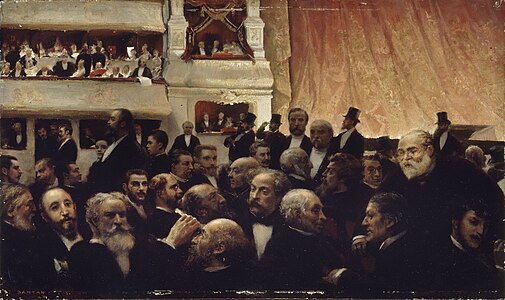 Édouard Dantan, Entracte d'une première à la Comédie-Française, 1885, Paris, Musée Carnavalet (Dreyfus est l'homme avec un pince-nez assis au deuxième rang, à droite).