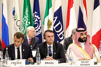 Bolsonaro, French President Emmanuel Macron and Saudi Crown Prince Mohammad bin Salman at the 2019 G20 Osaka summit 28 06 2019 Reuniao Paralela dos Lideres do G20, sobre Economia Digital (48142864762).jpg