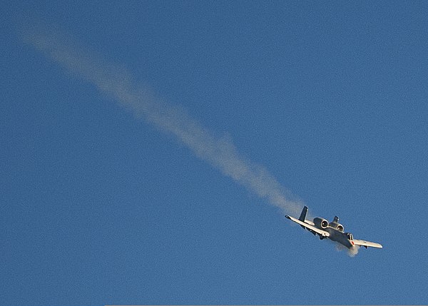 A-10 Thunderbolt II in a dive, conducting a strafing run