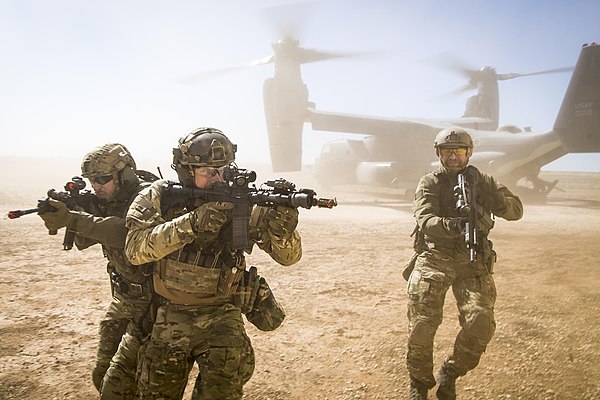 An American special forces team moves together out of an U.S. Air Force CV-22 Osprey aircraft on February 26, 2018