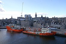 Vessels berthed at Regent Quay during 2009, the harbour board office is the quayside building featuring a clock-tower Aberdeen harbour - geograph.org.uk - 1248009.jpg