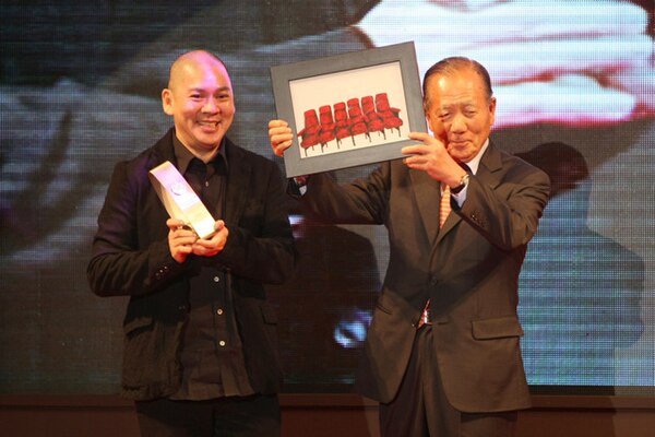 Tsai (left) was named Asian Filmmaker of the Year at the 2010 Busan International Film Festival.