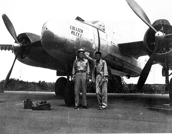 Deke Slayton (right) beside a Douglas A-26 bomber