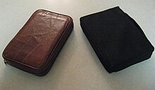 Bible cases made from leather (left) and synthetic fabric (right). Bible Cases.JPG