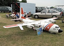 "Giant scale" 18 feet 6 inches (5.64 m) wingspan Lockheed C-130 Hercules radio control flying model powered with four internal combustion engines. A crew of five fly and maintain it. C-130j.hercules.model.arp.jpg