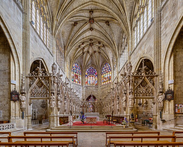 View from the nave of the chancel of Condom Cathedral in France, with ambulatories and two altars, the modern one in the choir