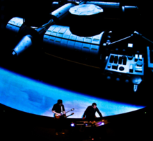 Carbon Based Lifeforms on stage in 2009. Vadestrid (right) is performing with a live guitarist.