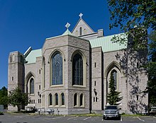 Eastern wall of the cathedral. The concrete and EIFS wall replaced a temporary wooden wall in the late 20th century. Christ Church Cathedral from the back, Victoria, British Columbia, Canada 15.jpg