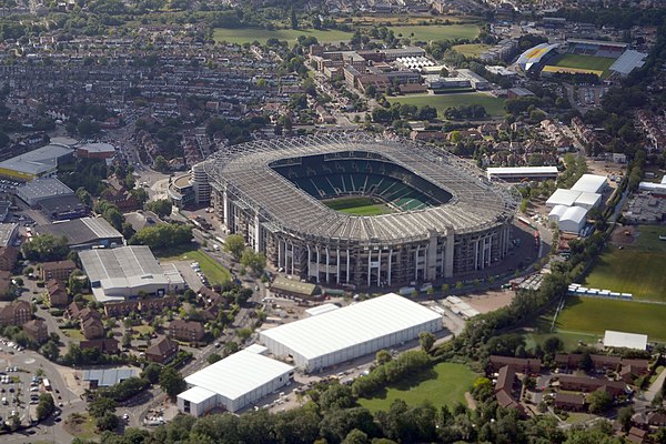 Aerial view of Twickenham Stadium (centre) and Stoop Stadium (background) from the north in August 2015