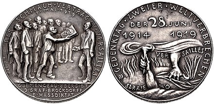 Commemorative medal issued in 1929 in the Republic of Weimar on the occasion of the 10th anniversary of the Treaty of Versailles. The obverse depicts Georges Clemenceau presenting a bound treaty, decorated with skull and crossbones to Ulrich von Brockdorff-Rantzau. Other members of the Conference are standing behind Clemenceau, including Lloyd-George, Wilson and Orlando.