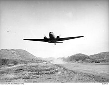 C-53 Dakota transport of the 21st Troop Carrier Squadron takes off from Kila on a supply dropping mission to the Kokoda area. Dakota takes off on supply mission.jpg