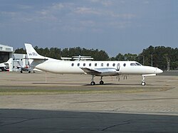 A Metro 23 at Sydney International Airport Fairchild Swearingen SA227 Metroliner (VH-VEU) at Sydney Airport.jpg