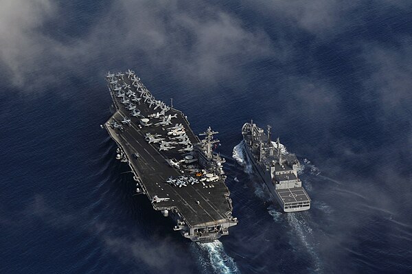 INS Shakti replenishing the USS Carl Vinson during Exercise Malabar 2012.