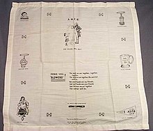 An ancient Order of Froth Blowers handkerchief, a humorous British charitable organisation, with the lyrics "The More We Are Together", a popular British children's song from the 1920s Froth Blowers Handkerchief.jpg