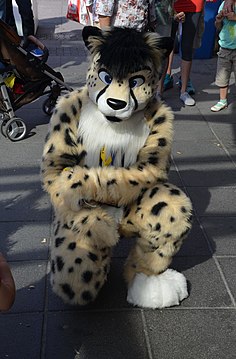 A cheetah fursuiter.