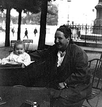 Gertrude Stein with Ernest Hemingway's son Jack in 1924. Stein is credited with bringing the term "Lost Generation" into use. GertrudeStein JackHemingway Paris.jpg