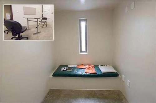 Cell in which a Guantanamo Bay prisoner was detained. Inset is the prisoners' reading room