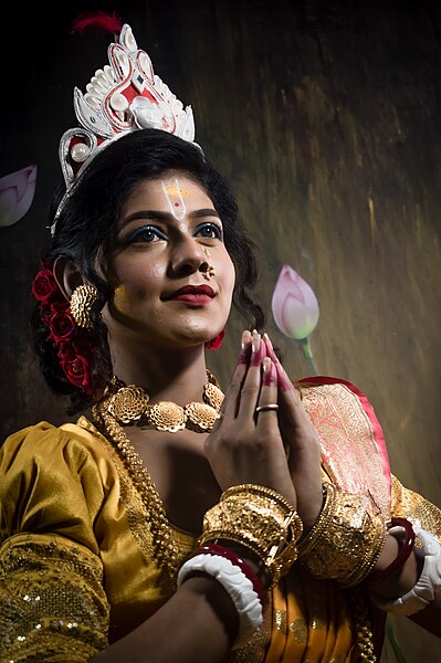 File:Indian krishna conscious woman in namaskar pose or welcoming.jpg