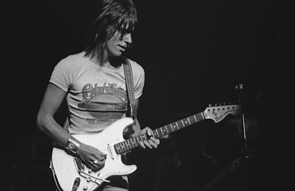 A 1975 cover version by Jeff Beck (pictured 1973) transformed "She's a Woman" into a reggae song, complete with a talk box.