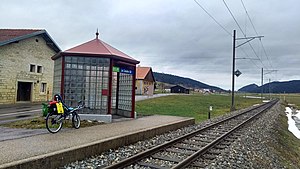 Shelter on platform next to railway line