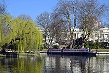 The east side of Little Venice basin (the willow tree is on the island), overlooked by white painted Regency houses Little Venice in March.jpg