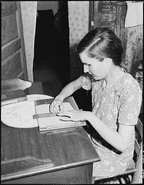 File:Lucy Sergent, 26, who has been blind since birth, writing. She attended the Kentucky State School for the Blind for... - NARA - 541365.jpg