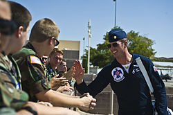 Maj. Jason Curtis, U.S. Air Force Air Demonstration Squadron no. 6 pilot, interacts with Civil Air Patrol cadets at Nellis Air Force Base. Maj. Jason Curtis interacts with Civil Air Patrol cadets from the Nevada Wing.jpg