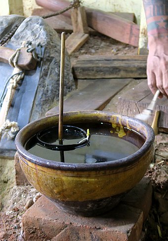 A water clock for goldbeating goldleaf in Mandalay (Myanmar)