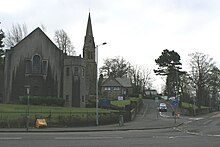 A view of the junction of Auldhouse Road, Thornliebank Road and Mansewood Road,which is the hill with the descending car. MansewoodRoad.jpg