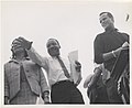 Martin Luther King, Jr. and Harry Belafonte near podium at Montgomery March (8388548852).jpg