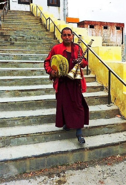 Monk with Gyaling and hats. Key Monastery Spiti, Himachal Pradesh, India