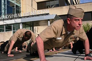 United States Navy personnel from the Naval Hospital Bremerton participating in the 22 Pushup Challenge in 2016 Naval Hospital Bremerton Command Master Chief Randy Pruitt drops for 22 pushups for 22 veterans on April 22, 2016.jpg