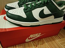 A green pair of Nike Dunk sneakers Nike Dunk Low Retro "Varsity Green".jpg