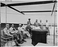 Photograph of President Truman and members of his party lounging in the sun on the after deck of his yacht, the... - NARA - 199033.jpg