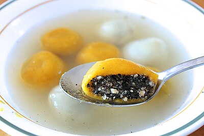 Pumpkin tang yuan (Chinese: 湯圓) with red bean paste and black sesame fillings