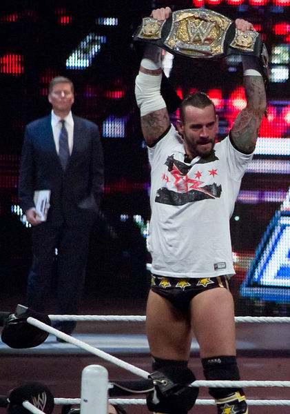 Laurinaitis, background, had a rivalry with WWE Champion, CM Punk, from late 2011 into early 2012