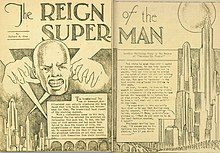 Du-paĝo disvastigita titolita "The Reign of the Superman (La Regado de la Superviro)".
Sur la maldekstra paĝo estas kalvaj viroj, kaj laŭ ambaŭ paĝoj estas futureca urbo.