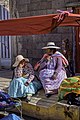 Rural_women_in_the_Sillustani_market_in_Peru