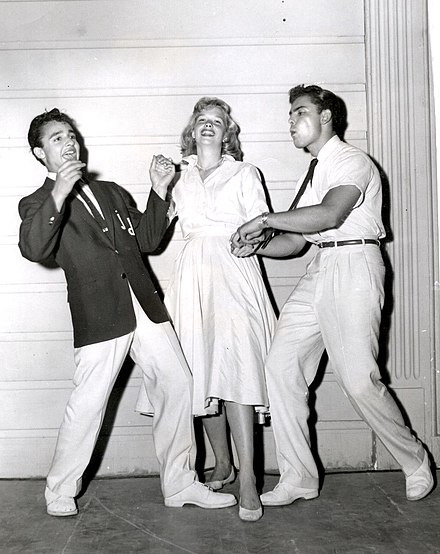 Mineo (left) with Sue George and John Saxon in a publicity still photo for Rock, Pretty Baby (1956).